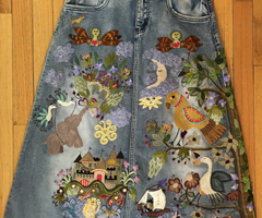 Hand-embroidered skirt design and created by Jennifer Alba
